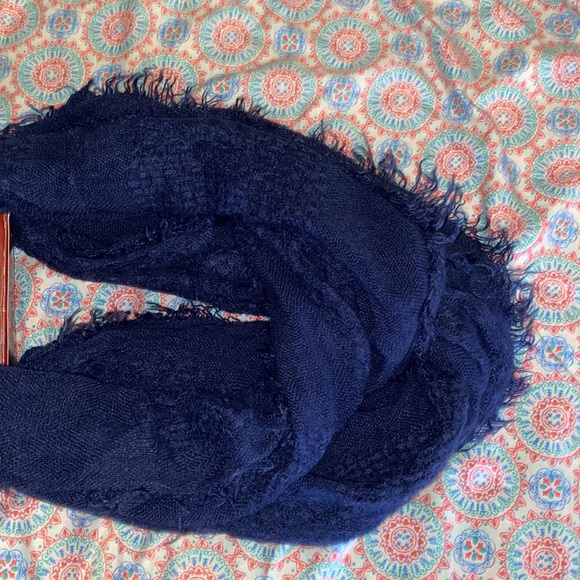 This is a lofty infinity scarf with multiple ways to wear it. - Picture 3 of 4